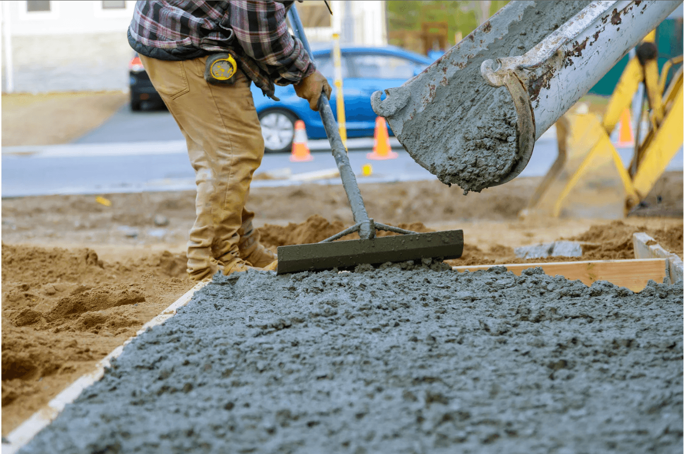 Concrete mix pouring from mixer truck